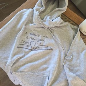 Reader lives a thousand lives sweater